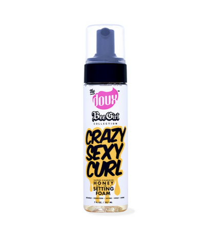 Bottle of 'Crazy Sexy Curl' setting foam from the Bae Girl Collection on a white background
