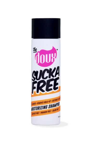 white bottle of Sucka Free Shampoo against white background