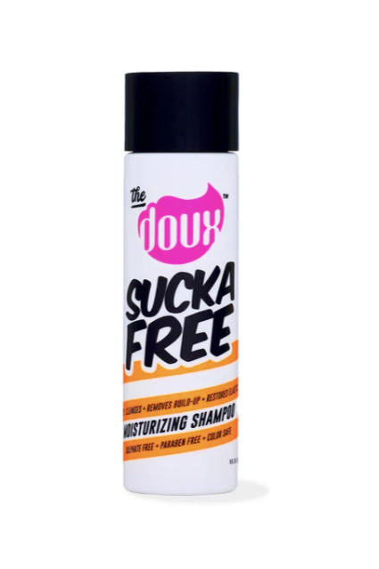 white bottle of Sucka Free Shampoo against white background